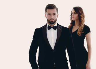 Full length of two business people isolated on white background