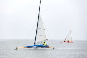 Ice sailing on the frozen Gouwzee near Monnickendam.