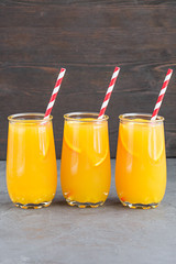Three glasses of delicious citrus juice