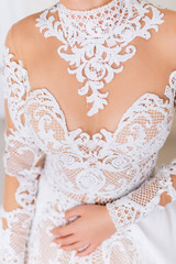 front view on a beautiful wedding dress with lace incredible