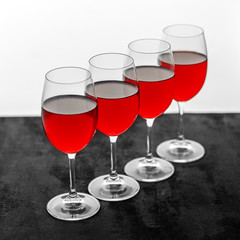 Many glasses of burgundy French wine. Concept restaurant, alcohol, party.