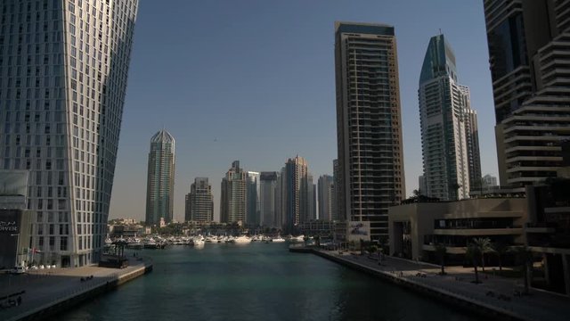 Dubai Marina's skyscrapers and boats