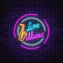 Neon sign of bar with live music. Advertising glowing signboard of sound cafe with saxophone symbol.