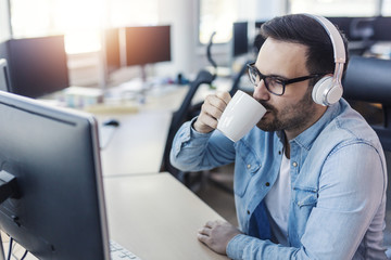 Programmer drinking coffee