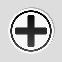 Medical cross icon. Sticker style with white border and simple shadow on gray background