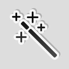 Obraz premium magic wand. simple silhouette. Sticker style with white border and simple shadow on gray background