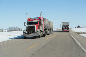 front view of a semi truck on the highway