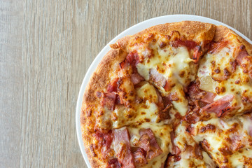 Delicious italian pizza served on wooden table