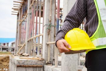 professional engineer worker at the house building construction site