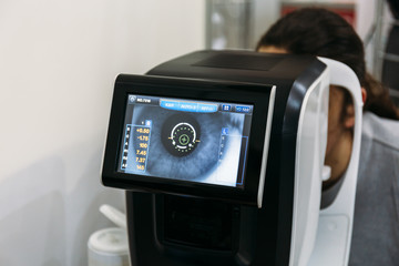 Ophthalmology eyesight diagnostic. Modern eye test machine equipment in ophthalmology clinic