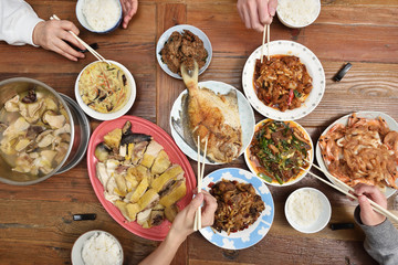 Top view of Chinese family enjoying dinner  