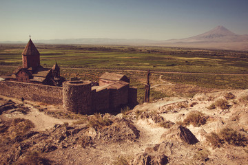 Khor Virap Monastery top view. Mountain Ararat on background. Exploring Armenia. Armenian architecture. Tourism and travel concept. Religious landmark. Tourist attraction. Copy space. Place of worship