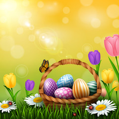 Easter greeting card with a full basket of colorful eggs and flowers in the grass