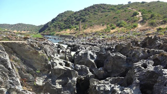 Pulo do Lobo or wolf's leap waterfall and cascade on river Guadiana, Alentejo, Portugal