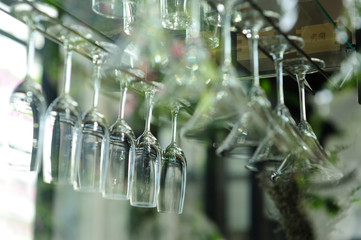 Wine glasses are arranged neatly.