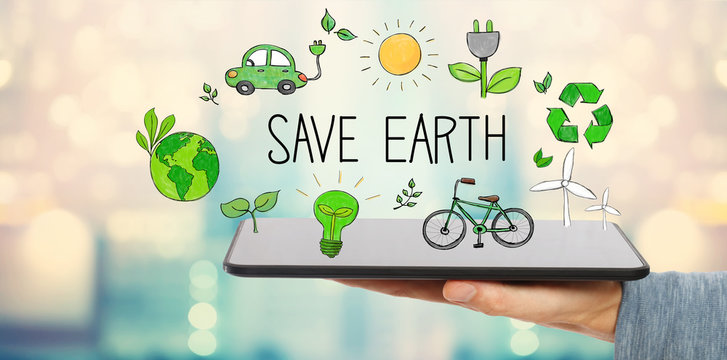 Save Earth with man holding a tablet computer