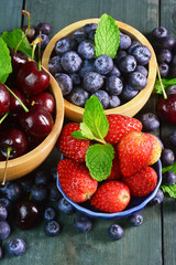 Naklejka na ściany i meble Mixed fruits berries, strawberry, cherries, blueberry.