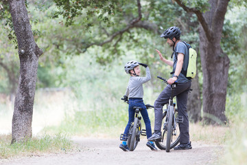 family biking in the park