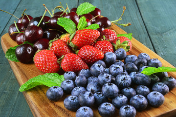 Fresh fruits berries, strawberry, cherries, blueberry.