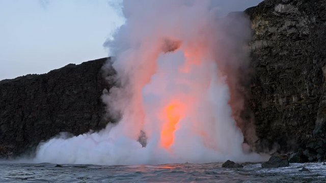 Lava from the Kīlauea volcano flows into the ocean on the Big Island of Hawaii