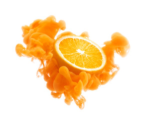 Orange fruit on ink isolated over white background