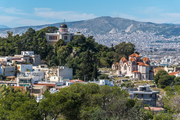 Fototapeta na wymiar Church Agia Marina and National Observatory on the Hill of Nymphis in Athens, Greece