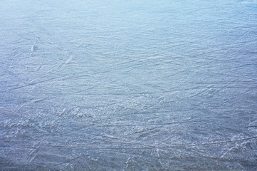 Blue surface of ice on the ice rink. Winter.