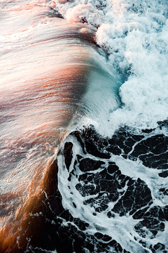 Elevated view of wave crashing in sea