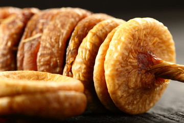 Delicious dried figs , macro detailed image ,dry fruits concepts background.