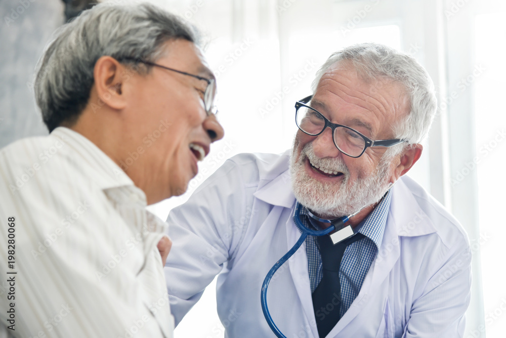 Wall mural Happiness of Senior male Doctor with Asian male patient.