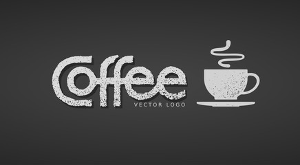 Coffee lettering with cup isolated on black background