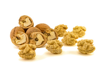 Hazelnut Turkish hazel to a wooden bowl. The concept of the growth of the transformation of hazelnut nuts into money dollars. Isolate on white background