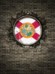Old Florida flag in brick wall