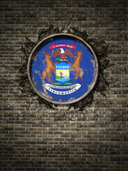 Old Michigan flag in brick wall