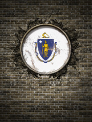 Old Massachusetts flag in brick wall