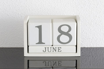 White block calendar present date 18 and month June
