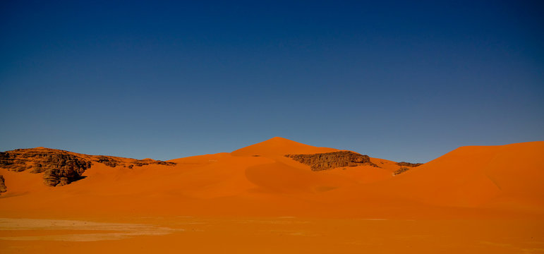 Landscape of sand dune and sandstone nature sculpture at Tamezguida in Tassili nAjjer national park, Algeria