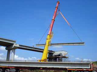 Crane fixed the concrete beam