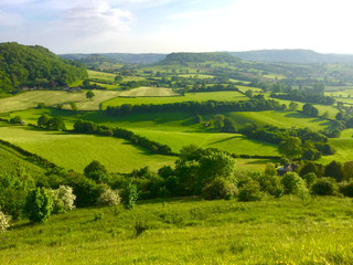 Fototapeta na wymiar The Green Hills and Valleys of the Gloucestershire Countryside in Spring and Summer.