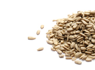Salted sunflower seeds isolated on white background, top view