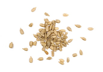 Salted sunflower seeds isolated on white background, top view