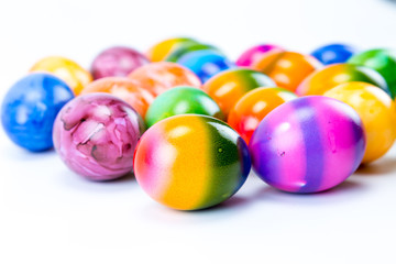 Rainbow colorful hand painted easter eggs with white background