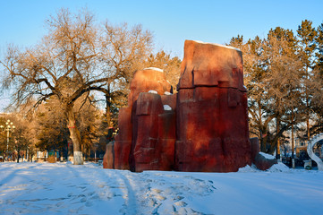 The red megalith  in the park.