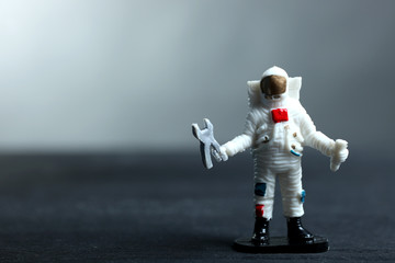 Cosmonaut mechanic standing on the planet's surface