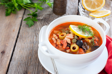 Traditional Russian soup Solyanka in Moscow, horizontal, copy space