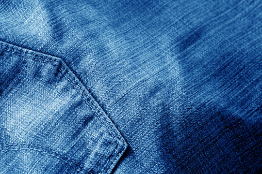 Jeans with pocket with blur effect in navy blue tone.
