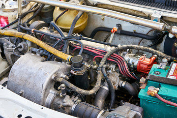Fototapeta premium 1980's Motor Engine on A Vintage Car