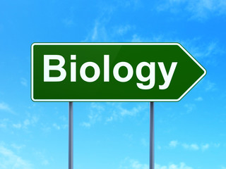 Learning concept: Biology on green road highway sign, clear blue sky background, 3D rendering