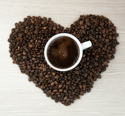 Coffee beans heart. Cup of coffee.