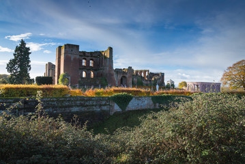 Ruined walls and towers of Kenilworth Castle on a bright Autumn day, Kenilworth, Warwickshire, England, UK, November 2017